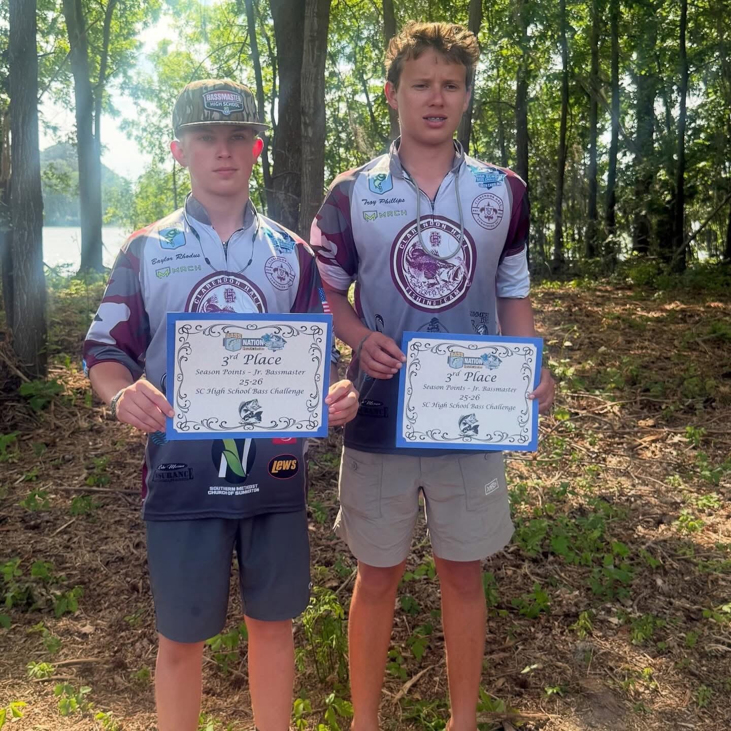Two Clarendon Hall anglers holding third-place certificates